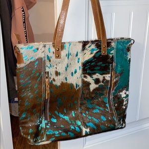 Wild heifers boutique cowhide purse
